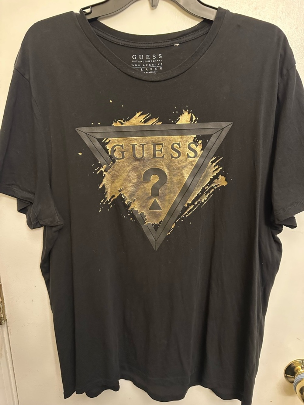 Guess Black Short-Sleeve Tee with Gold Triangle Logo